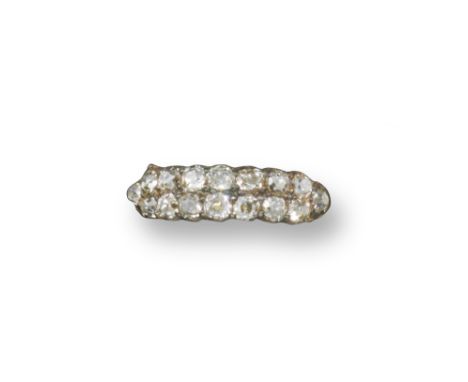 An early nineteenth century two row diamond half hoop ring, set with sixteen matched cushion-shaped diamonds in silver on gol