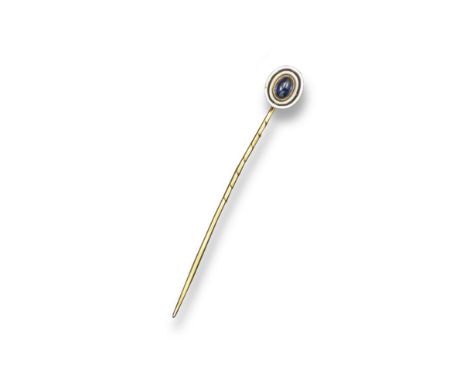 An early twentieth century diamond set stick pin, centred with a cushion-shaped diamond millegrain-set within a surround circ