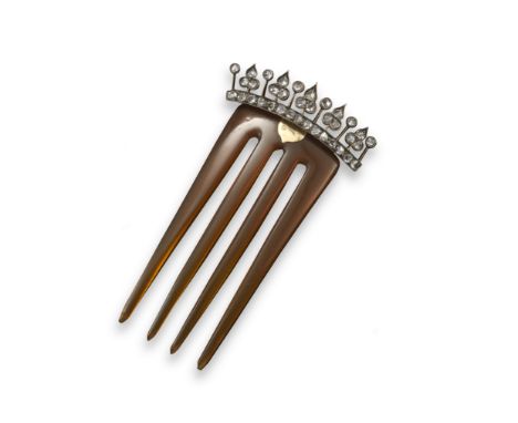 A late 19th century diamond-set hair comb, the blonde tortoiseshell comb surmounted with a line of diamond trefoils in silver