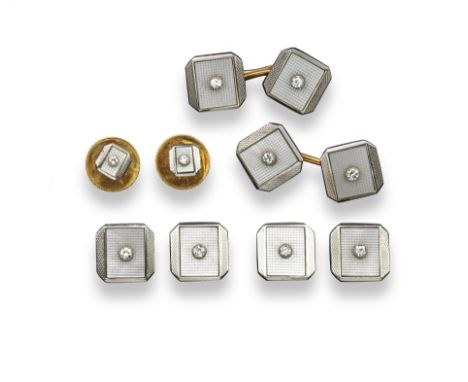 A gentleman's dress set, comprising cufflinks, buttons and two studs, of square form with engine turned decoration and set wi