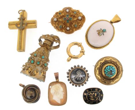 A late Victorian gold brooch, mounted with emeralds, a ruby and seed pearls. A Victorian gold target brooch mounted with a ce