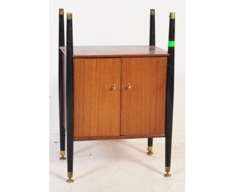 Nathan - A 1960's mid 20th Century teak wood bedside chest / side lamp table by Nathan. Of simple form having a single cupboa