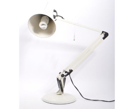 A mid 20th century retro angle poise industrial lamp light. Having a conical tapering shade, into spring loaded supported bar