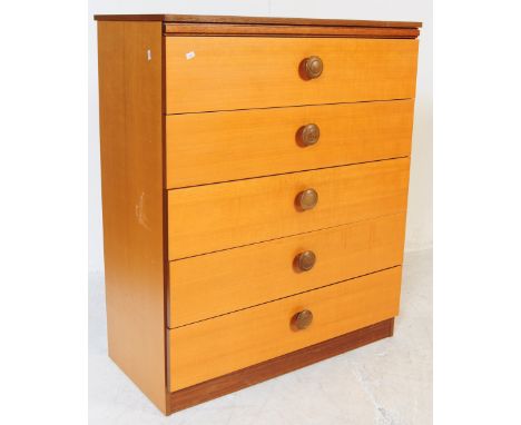 British Modern Design - A mid 20th century light wood chest of drawers. Rectangular form with a bank of five drawers. Support