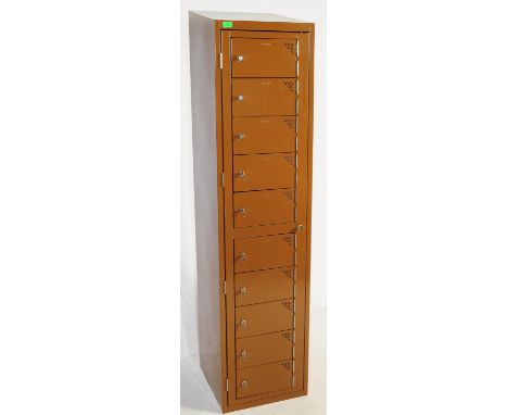 A contemporary Sperrin SP upright metal pedestal locker cabinet. Industrial form with brown enamel painted finish to the meta