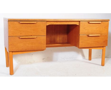 Stonehill - A retro mid 20th century light oak kneehole desk. The desk having central kneehole flanked by bank of twin drawer