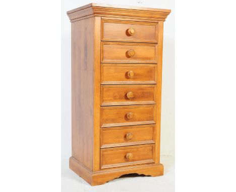 A contemporary 20th century country pine pedestal chest of drawers. Raised on a plinth based with upright bank of drawers hav