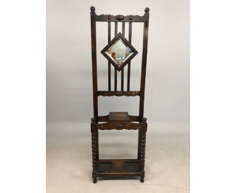 Oak Arts & Crafts hall stand with diamond shaped bevel edge mirror, coat hooks and original umbrella drip trays approx 193 x 