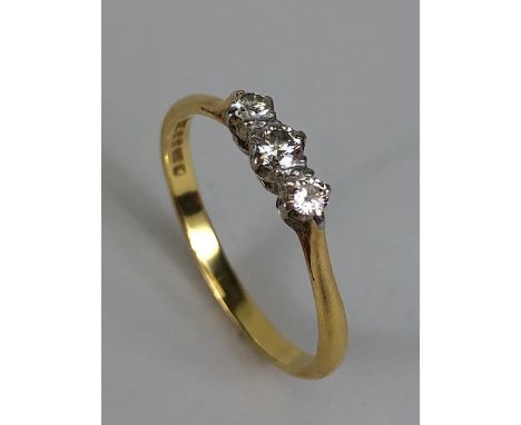 Antique and vintage jewellery, 18ct gold hallmarked ring set with three diamonds approximately 2.11g size P
