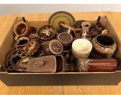Collection of Devonshire treacle glazed pottery, cups, plates, jugs, teapot, butter dish, storage jars etc 