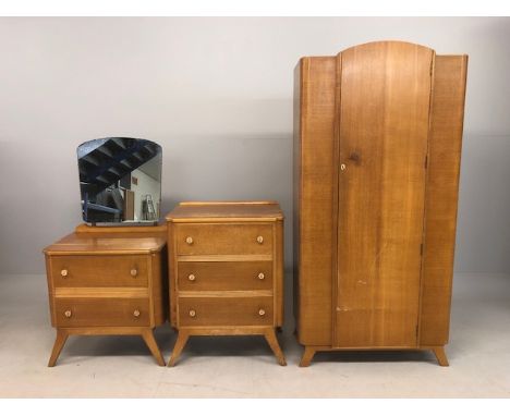 Mid-century bedroom suite consisting single wardrobe, chest of drawers on splayed feet with matching dressing table 