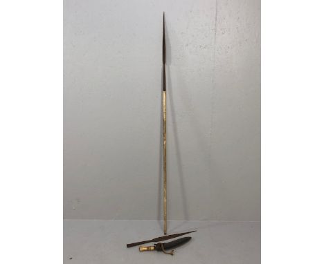Antique Militaria Arms and Armour, two African spear heads and a Nepalese Kukri the scabbard decorated with various coloured 