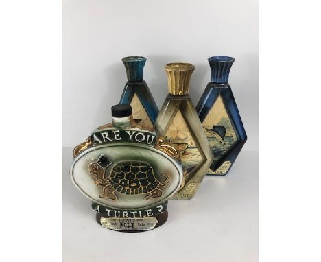 Collectable bottles, four vintage ceramic Beam Whiskey bottles, featuring Rainbow Trout, Bass, Sail fish, Turtle 