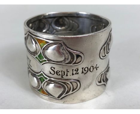 Silver and enamelled Art Nouveau napkin ring, decorated with blue/green/orange enamel Birmingham 1904, by maker Liberty & Co 