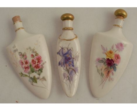 Three Royal Worcester porcelain scent bottles, decorated with flowers, circa 1890, two with gilt stoppers, one unmarked, heig