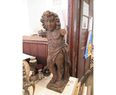 An Antique Italian wooden model of cherub, missing arms, height 26.5ins
