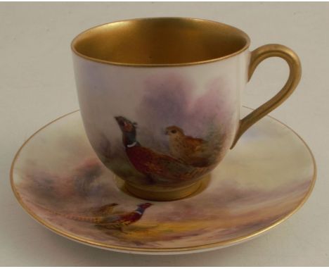 A Royal Worcester coffee can and saucer, decorated with pheasants by James Stinton, circa 1917