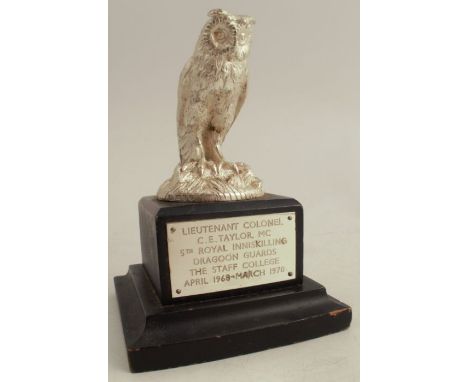 A silver model, of an owl, on a stand, with dedication, London 1969, weight of the owl, including the pin, is 16oz&nbsp; (i.e