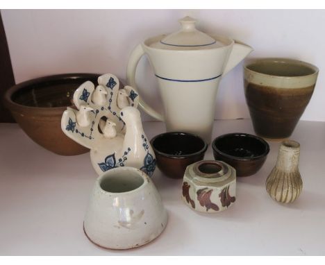 A studio pottery bowl, a beaker, a coffee pot, five small pots and a bird model by F G Moore