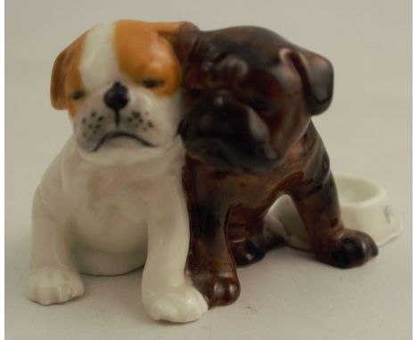 A Royal Worcester model, of two boxer / bulldog puppies by a dish, shape number 3313 - Good condition