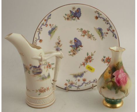 A Royal Worcester vase, decorated with roses, shape number H283, height 5.75ins, together with a Royal Worcester tusk jug, wi