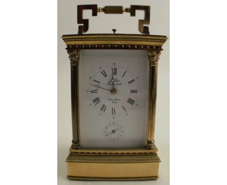 A brass cased repeating carriage clock, the rectangular enamel dial inscribed L Epee, height including handle 7.5ins