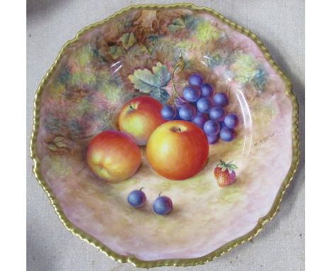 A Royal Worcester cabinet plate, decorated with fruit to a mossy background by H Aryton, with gilt shaped edge, diameter 10.5