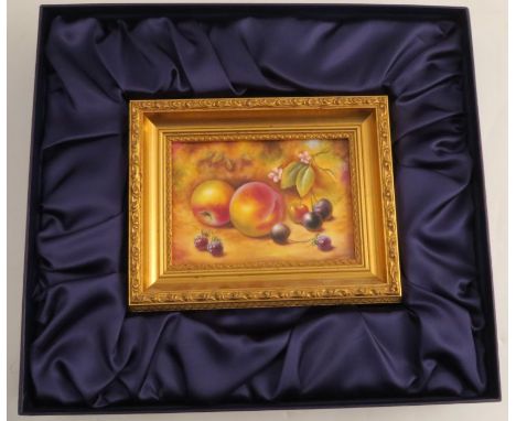 A Royal Worcester rectangular porcelain plaque, decorated with fruit to a mossy background by C Winwood, 4.75ins x 6.5ins, fr