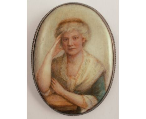 A miniature portrait on ceramic, the reverse monogrammed EM with 1913, the oval panel 6.5cm x 4.7cm&nbsp;