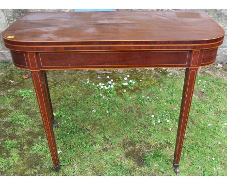 A 19th century mahogany boxwood strung fold over card table, width 36ins