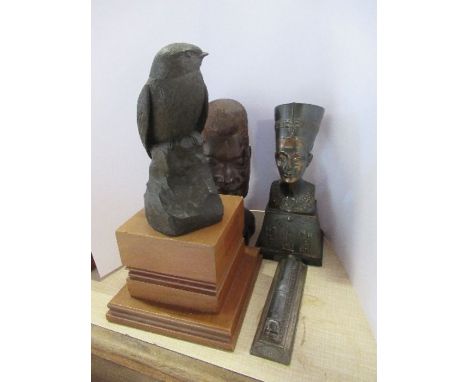 A resin model of a bird, signed Dulk, a bust model of Nefertiti, tribal bust and a model of streamline engine 'Silver Link'