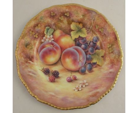 A Royal Worcester cabinet plate, decorated with fruit to a mossy background by D Fuller, with gilt shaped edge, diameter 10.5