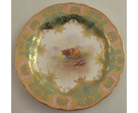 A Royal Worcester plate, decorated with cattle by Townsend, to an apple green and gilt border, diameter 9ins