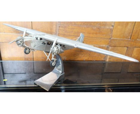 An Authentic Models Ford Trimotor Plane, made in flat or corrugated sheet metal, a model of the monoplane built between 1925-