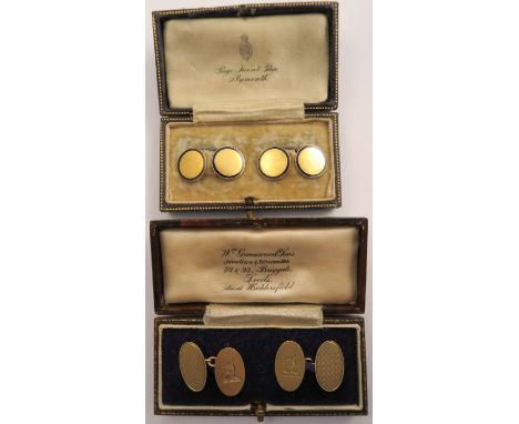 A pair of 18 carat gold part enamel cuff links, 4gms, together with a 9ct gold pair, engraved with a crest