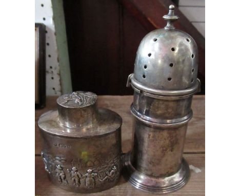 An oval silver caddy, with embossed decoration of figures, weight 2oz, together with a white metal sugar caster