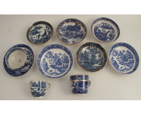 A 19th century Caughley dish, decorated in the Fisherman and Cormorant pattern, together with other tea cups, bowls and sauce