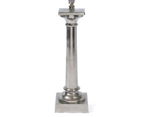 A SILVERED METAL TABLE LAMP in the form of a classical column of square base, 16cm wide x 57cm high