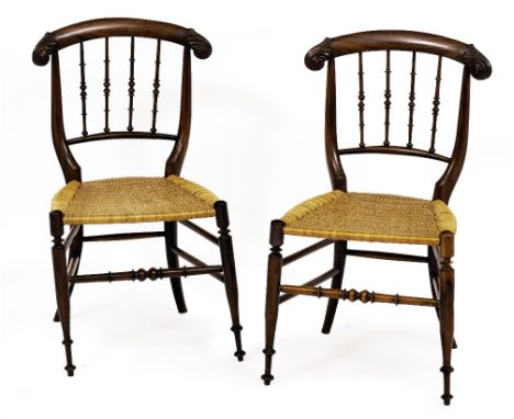 A PAIR OF MID VICTORIAN ROSEWOOD CHILD'S CHAIRS with scroll terminals to the cresting rails, bobbin turned decoration to the 