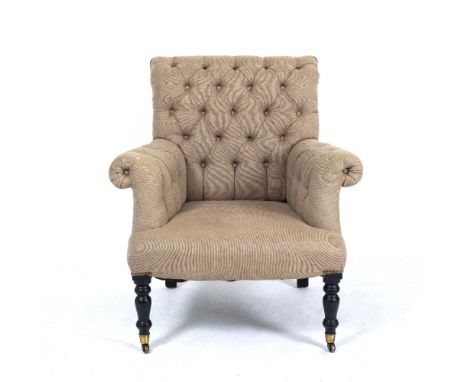 AN EICHHOLTZ BUTTON UPHOLSTERED ARMCHAIR with turned ebonised front legs and brass casters, 82cm wide x 86cm deep x 89cm high