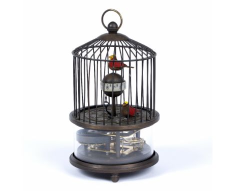 A MODERN TIMEPIECE in the form of a bird cage with automaton birds and movement beneath, 9cm diameter x 17cm high 