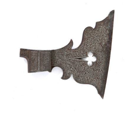 AN ANTIQUE INDIAN STEEL AXE HEAD with engraved decoration of birds in branches, 17cm wide x 17cm high
