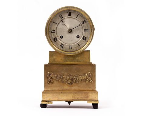 A FRENCH BRASS CASED MANTLE CLOCK with drum movement on a stepped plinth with turned feet, the movement striking the hours an