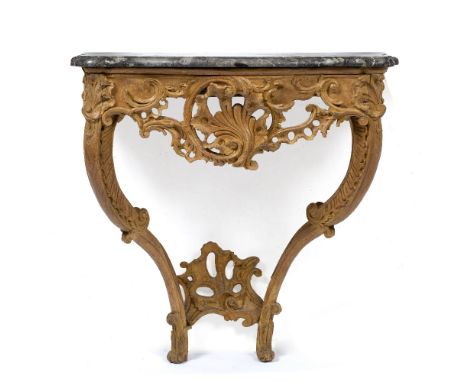 A 19TH CENTURY FRENCH CARVED PINE SERPENTINE MARBLE TOPPED CONSOLE TABLE decorated in the Rococo manner, 81cm wide x 46cm dee