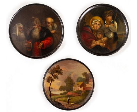 AN 18TH CENTURY CONTINENTAL PAPIER MACHE CIRCULAR SNUFF BOX the lid painted with three patricians, indistinctly inscribed wit