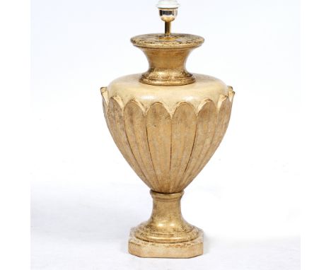 AN ITALIAN GILDED TABLE LAMP of baluster form, 60cm high together with two similar candlesticks, each 35cm high (3)