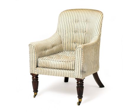 AN EARLY 19TH CENTURY GILLOWS STYLE ARMCHAIR with rounded back, striped button upholstery, squab cushion and reeded turned ta