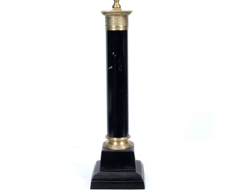 AN EMPIRE STYLE BLACK PAINTED TABLE LAMP in the form of a column on a square base, the base 18.5cm wide, the lamp 68cm high t