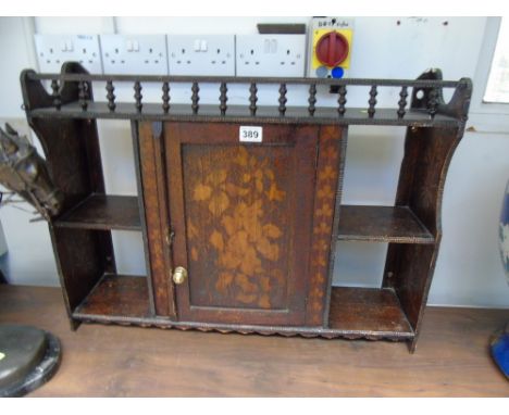 GALLERIED WALL HANGING SHELF WITH CENTRAL CUPBOARD