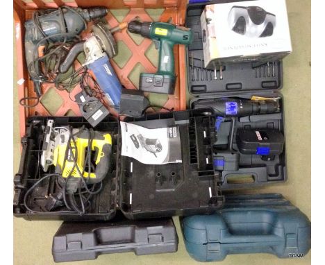 A tray of power tools corded and cordless